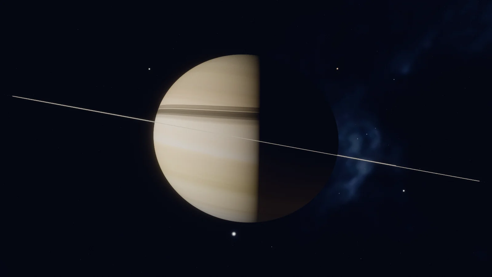Saturn half lit: its left half pale gold with faint bands, its right half in darkness. Seen edge-on, the rings cross it as a thin bright line.